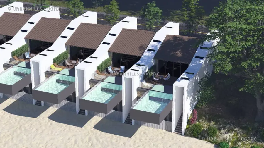 Aerial perspective of attached coastal villas with private terraces and pools